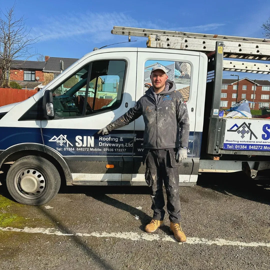 Sonny and team of SJN Roofing with company van